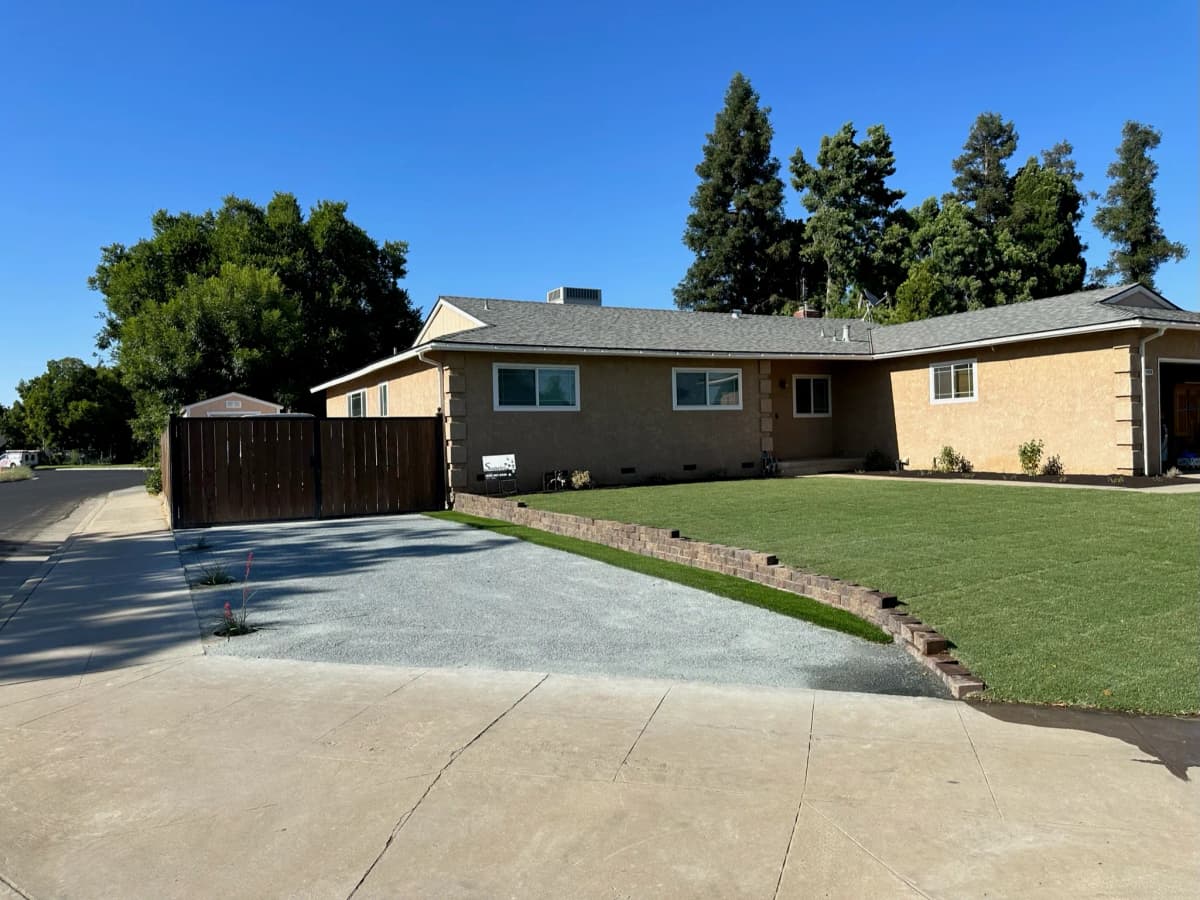 Beautifully landscaped yard by Suarez Lawn Services