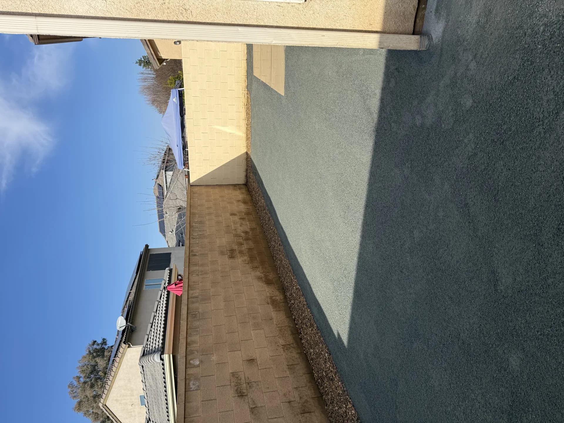 DG side yard with block wall — angle 2