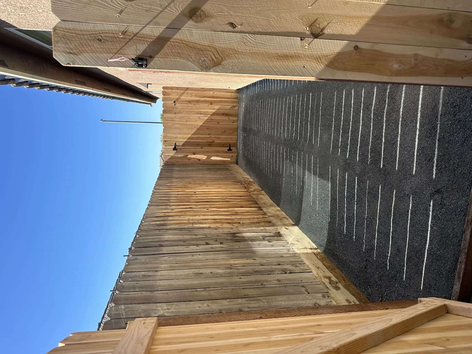 DG side yard with new wood fence